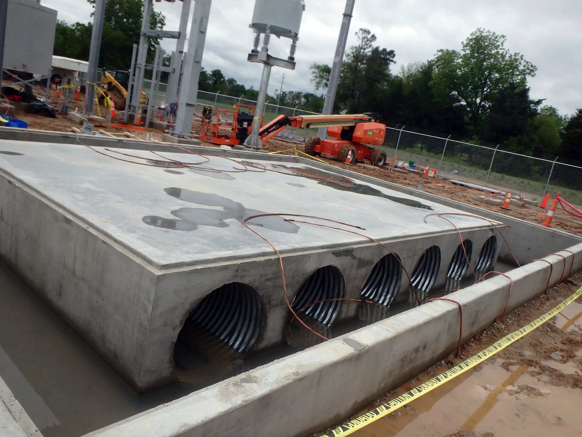 Reinforced concrete pad where an electrical transformer is to be set by H. Brown, Inc.